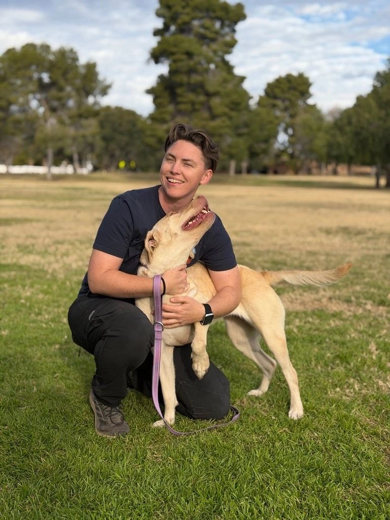Trainer working one-on-one with a dog