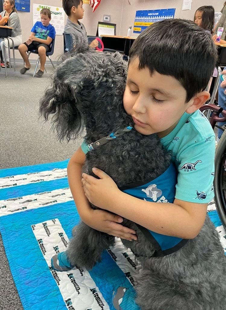 Therapy dog visiting patient